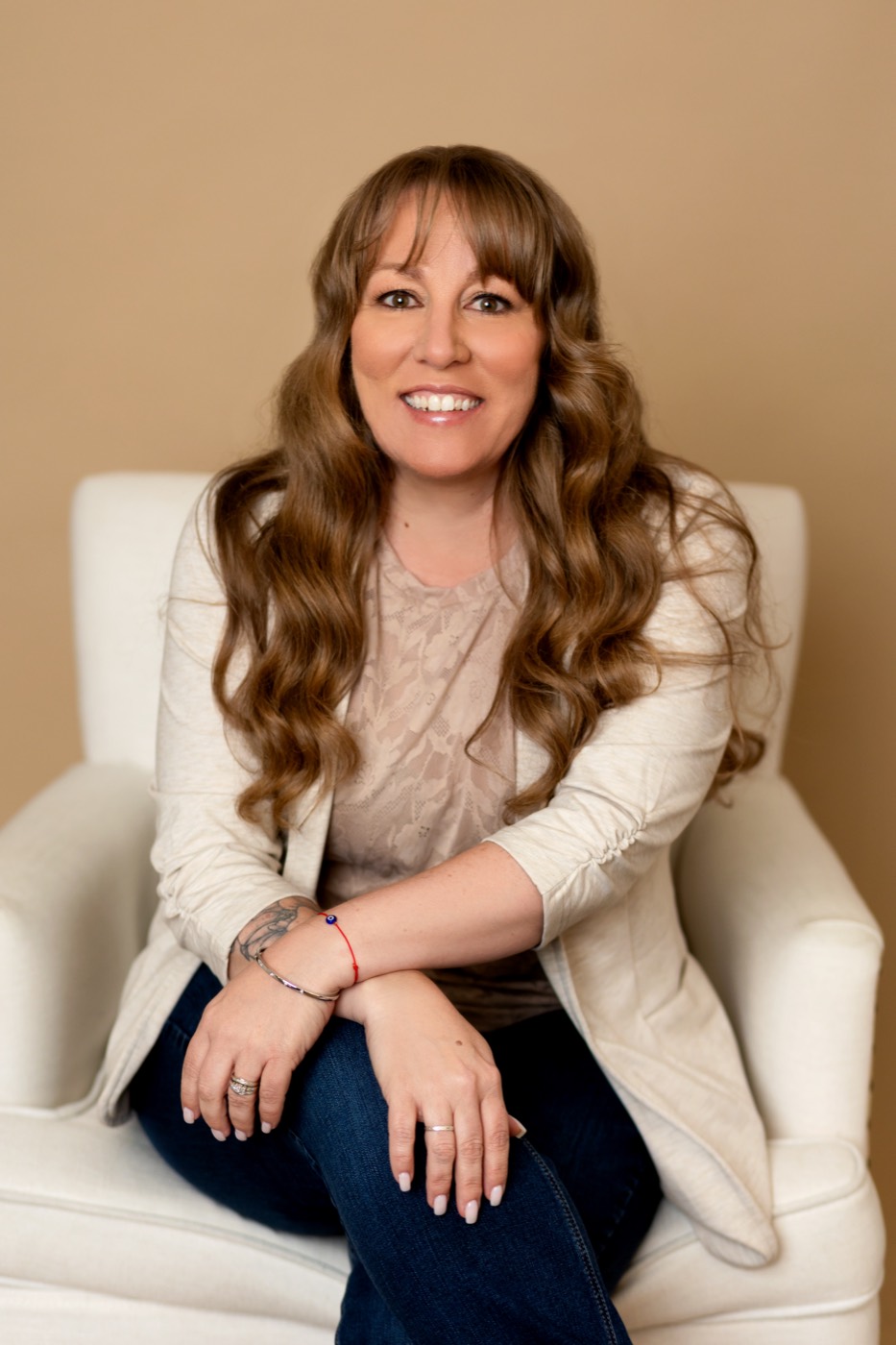 Amanda Long seated in a chair