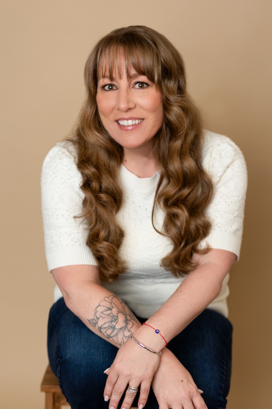 Amanda Long, seated and smiling
